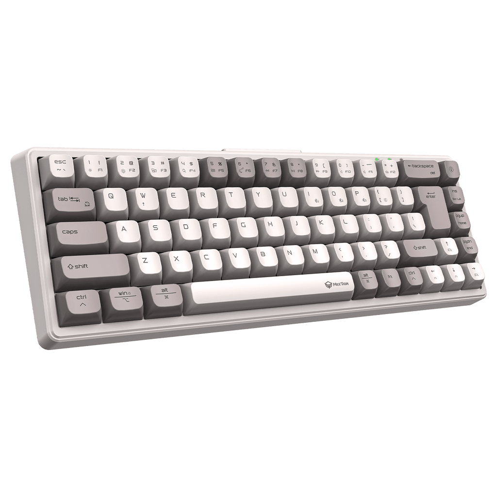 Mechanical keyboard with gray and white keys on a green background