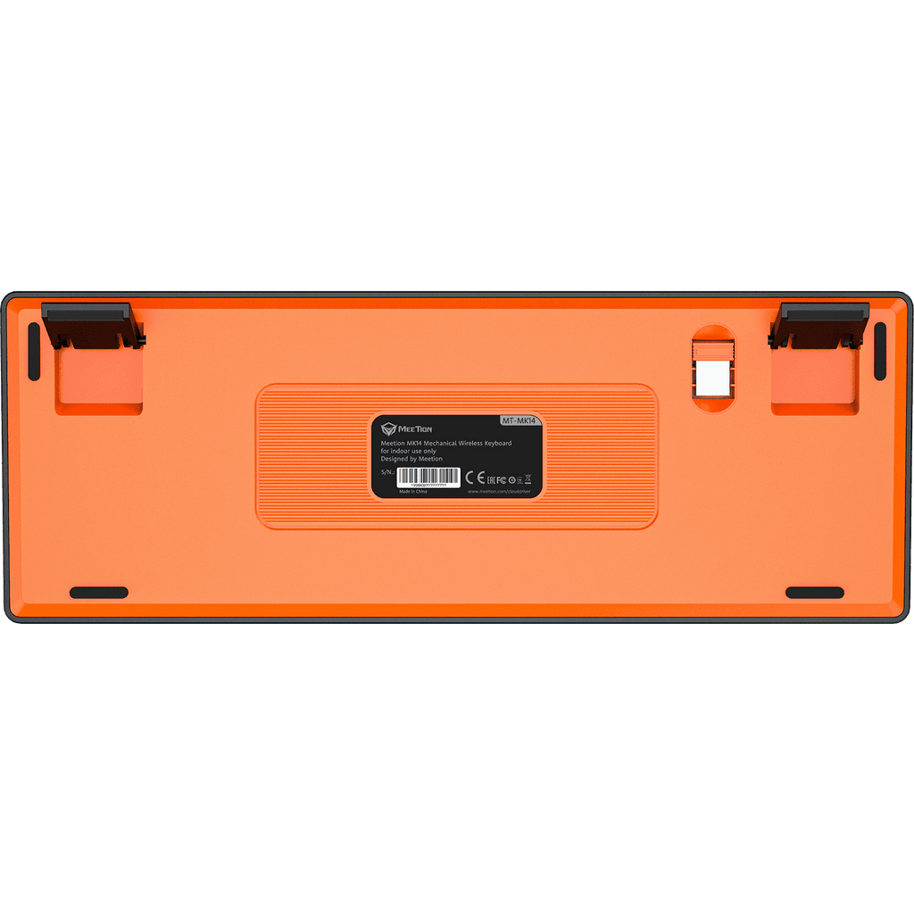 Orange electronic device with a label on a green background